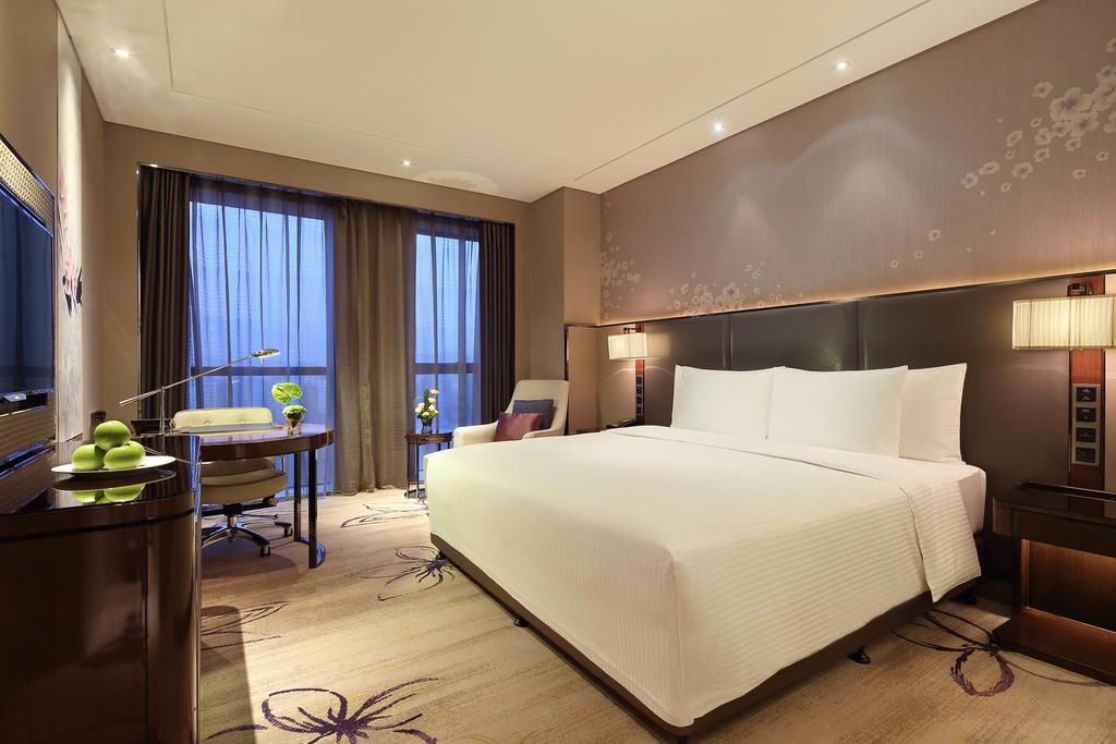 Wanda Realm Guangyuan Hotell Rum bild