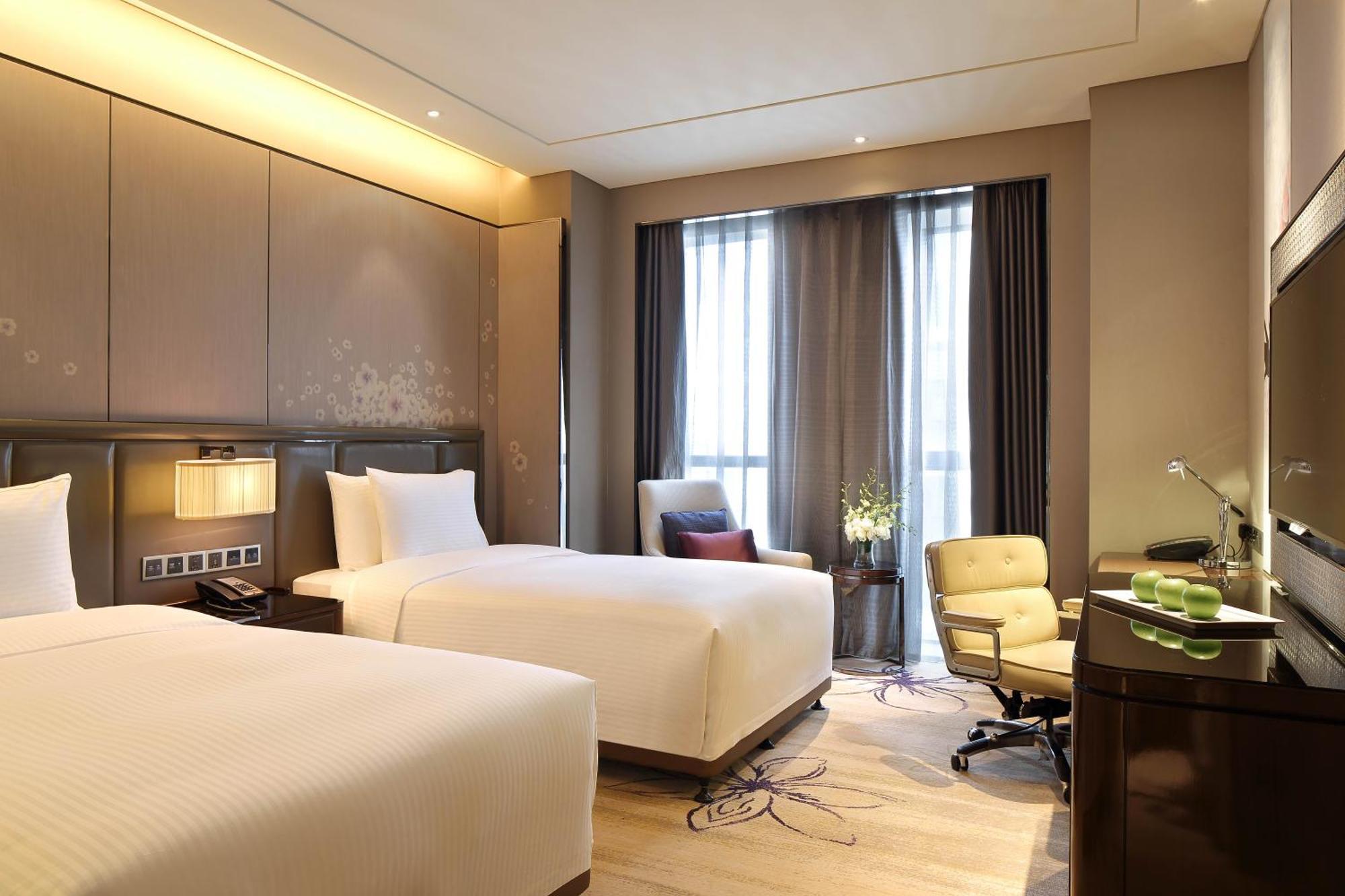 Wanda Realm Guangyuan Hotell Exteriör bild