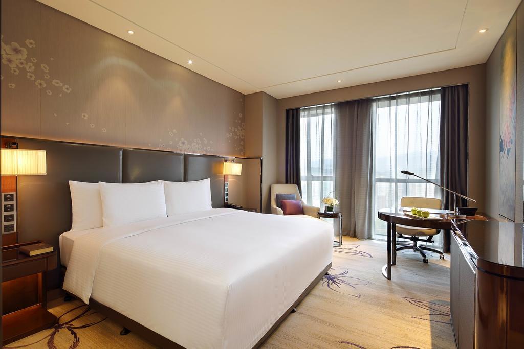 Wanda Realm Guangyuan Hotell Rum bild